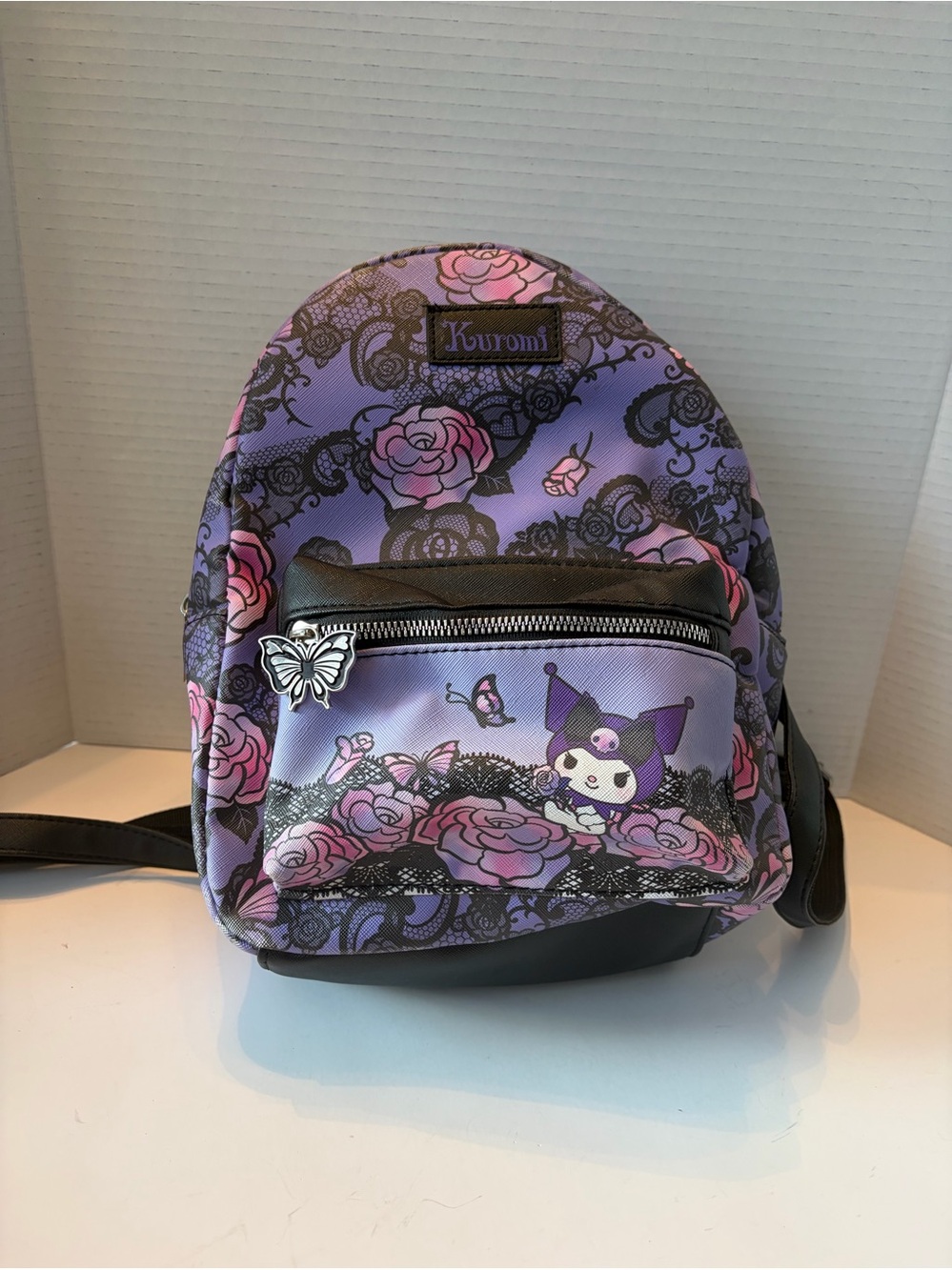 This Kuromi Roses Lace Mini Backpack by Bioworld